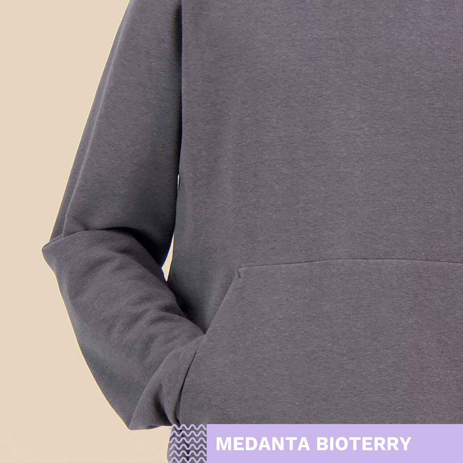 Medanta Bioterry -harmaa college ja tekstigrafiikka, beige tausta