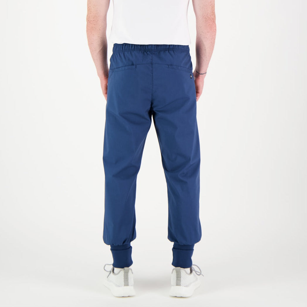 Mallin päällä siniset Tuisku unisex työhousut takaa